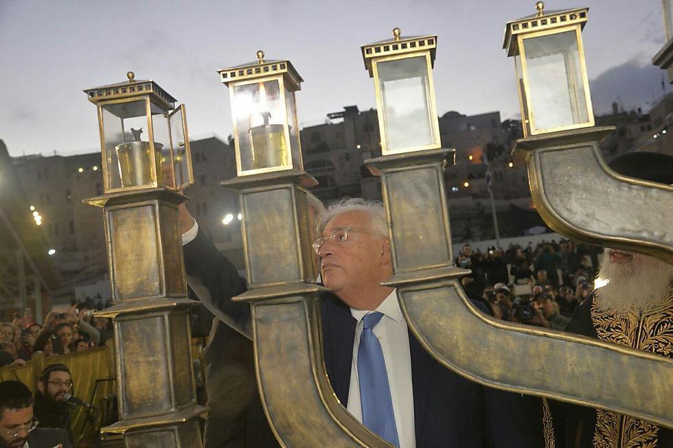 Ambassador Friedman lights the menorah at the Kotel