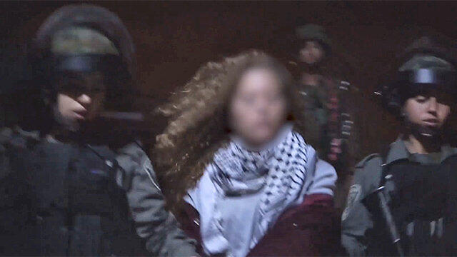 Tamimi being arrested by Border Policewomen