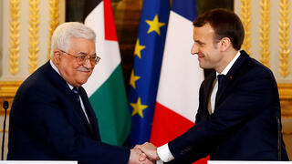 Palestinian Authority Chairman Mahmoud Abbas and French President Emmanuel Macron 