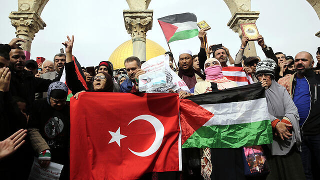 Turkish and Palestinian flags on the slopes of the Temple Mount