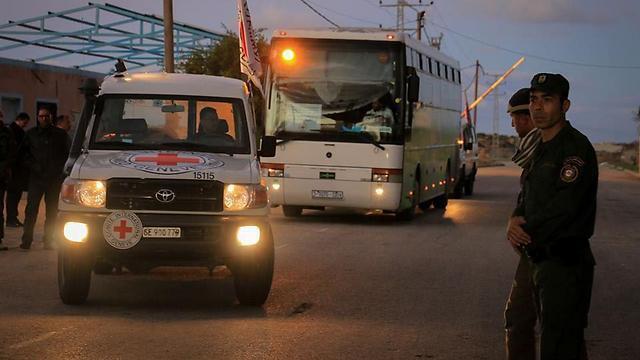 Red Cross escorts the bus back to Gaza