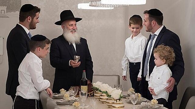A Haredi family's Shabbat table--with no women present