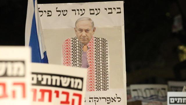 PM draped in the ostensibly pro-Netanyahu newspaper Israel Hayom