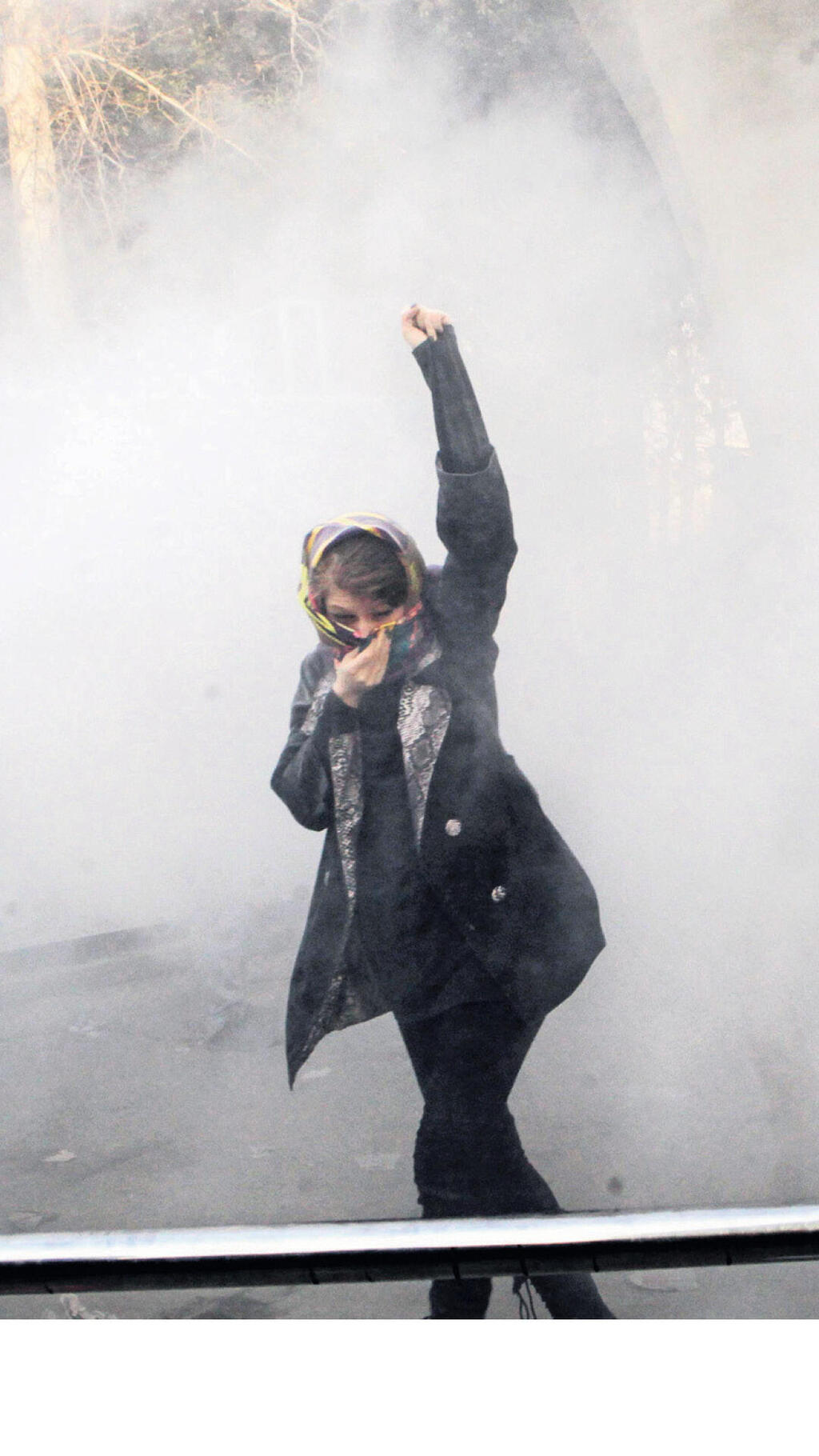 A protestor in Tehran in December 2017. Every protest generates claims that the regime is about to collapse 