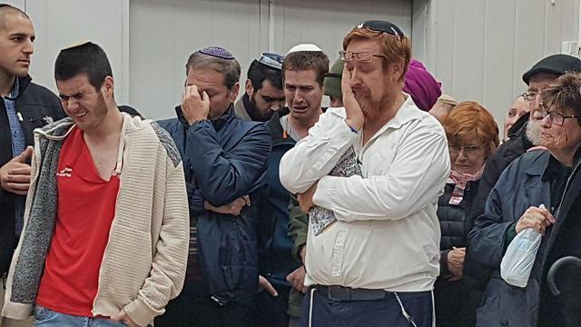 MK Glick (R) at his wife's funeral, Monday