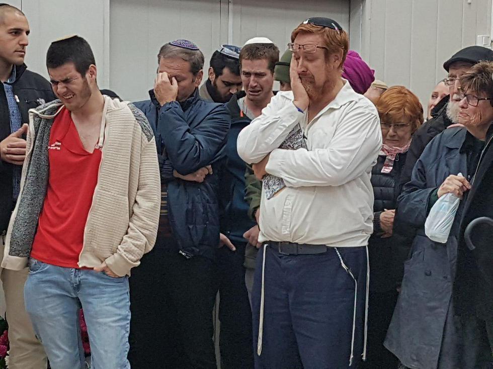 Glick and his family at his wife's funeral