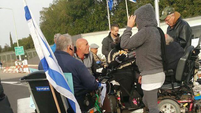 Disabled protesters decried the law's passage