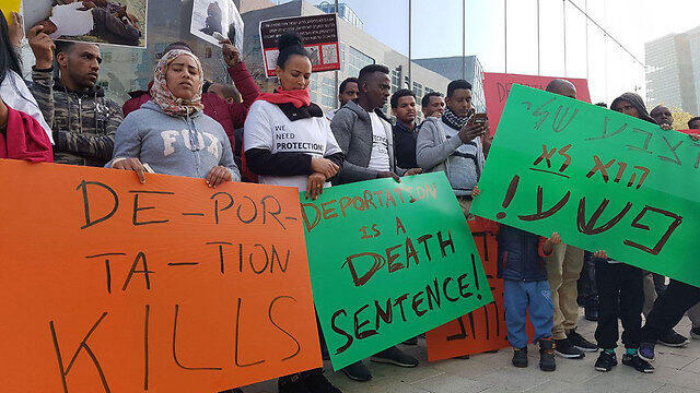The African migrants' demonstration outside the Rwandan embassy