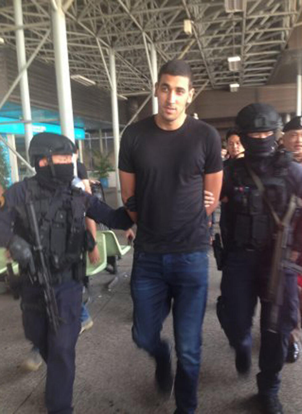 Eyal Bokel being brough into custudy