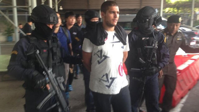 Dolev Zuarez being brought into custudy