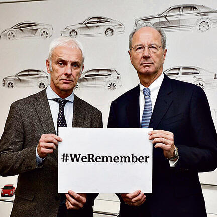 Volkswagen CEO Matthias Muller (L) and Chairman of the Supervisory Board Hans Dieter Potsch participated in the WeRemember campaignnullnull Volkswagen CEO Matthias Muller (L) and Chairman of the Supervisory Board Hans Dieter Potsch participated in the WeRemember campaign