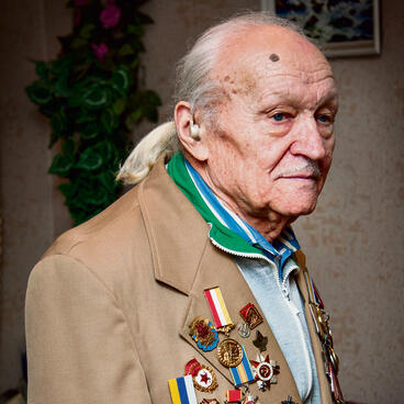 Zaslavsky with his long hair and medal-laden jacket