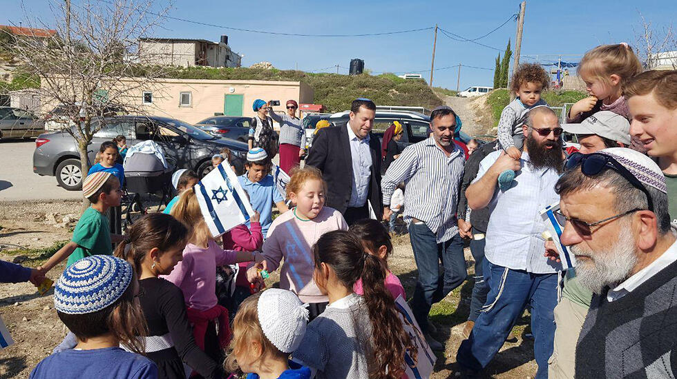Residents in Havat Gilad celebrate the government decision (צילום: מועצת שומרון) Residents in Havat Gilad celebrate the government decision