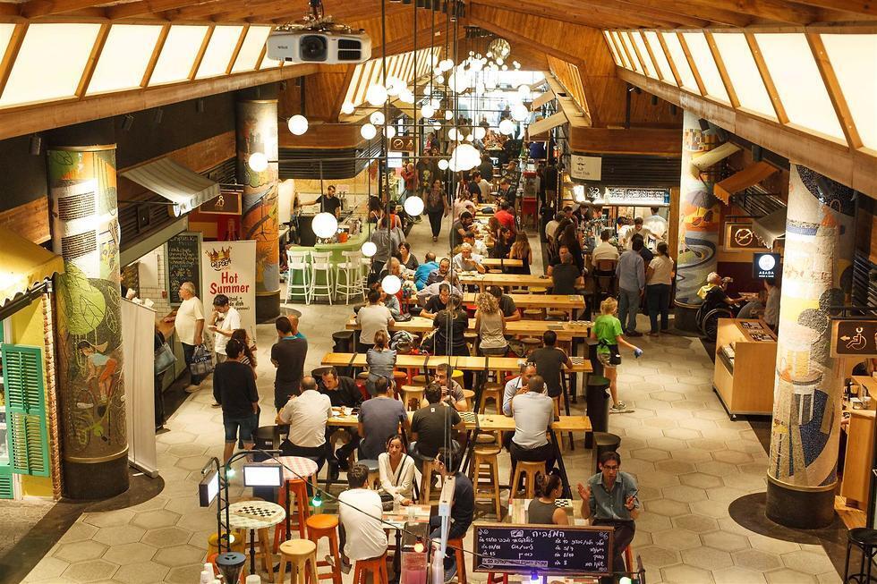 Рынок "Алленби-Ротшильд". Фото: Хаим Йосеф (צילום: חיים יוסף) Рынок "Алленби-Ротшильд". Фото: Хаим Йосеф