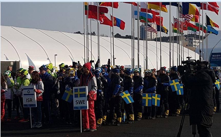 הנפת דגל ישראל אולימפיאדת החורף (צילום: פייסבוק הוועד האולימפי) הנפת דגל ישראל אולימפיאדת החורף