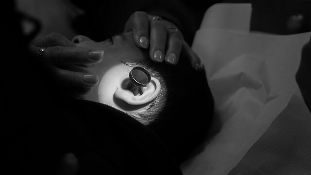 Syrian child undergoes ear examination in Israel