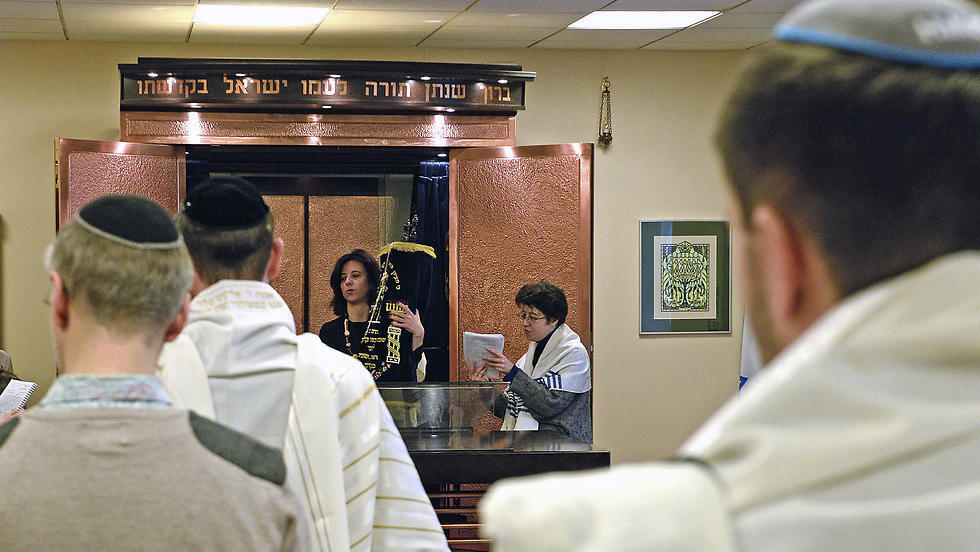 The head of Warsaw's Jewish community, Anna Chipczynska celebrates the Shabbat along with others in a synagogue in Warsaw. (Photo: AP) The head of Warsaw's Jewish community, Anna Chipczynska celebrates the Shabbat along with others in a synagogue in Warsaw.
