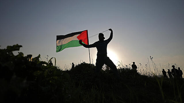 Palestinian protester near the Gaza border