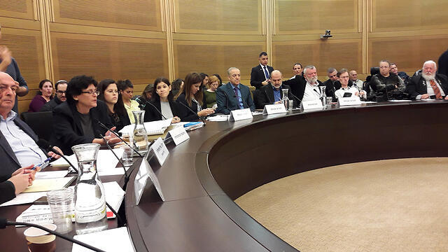 The Knesset's Welfare Committee debating the bill