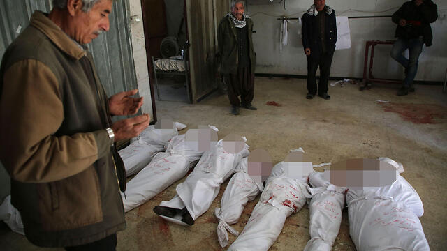 Тела убитых при обстреле Восточной Гуты. Фото: AFP