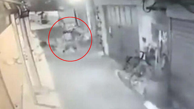 Man being knocked down by the soldiers