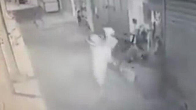 Suspect charges with an object in his hand