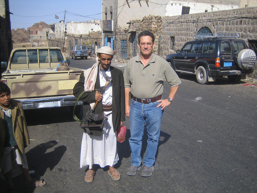 With Yemeni fighter in Raida, Yemen 2007