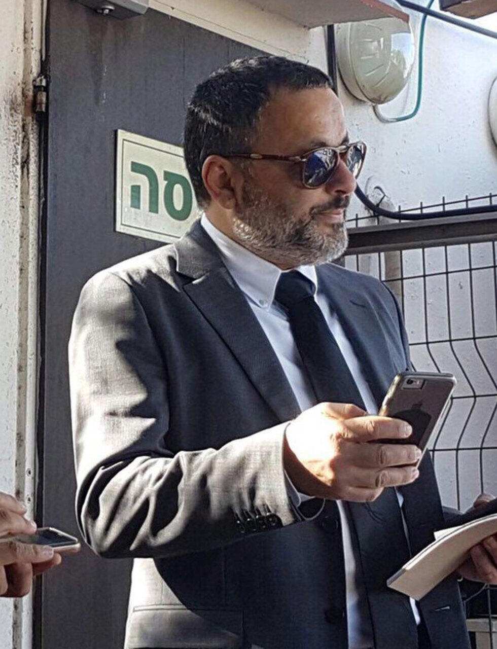 Adv. Ilan Sofer at the entrance to Lahav 433 Unit