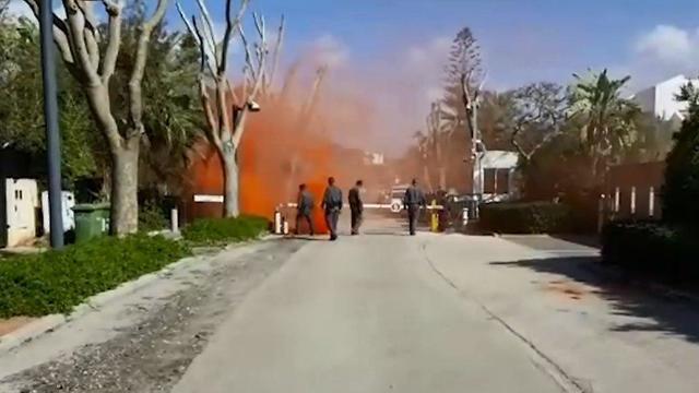 Police force putting out the flare
