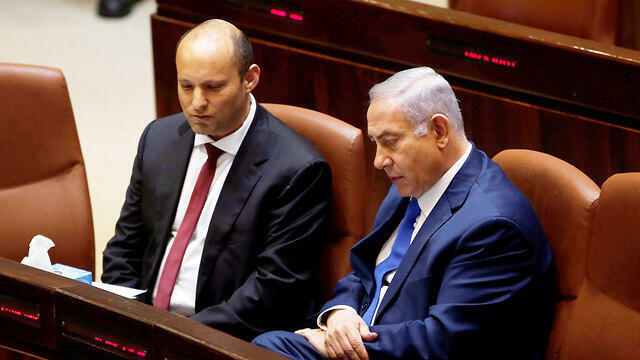 Benjamin Netanyahu and Naftali Bennett in the Knesset in 2018 (Photo: Reuters/Archive)