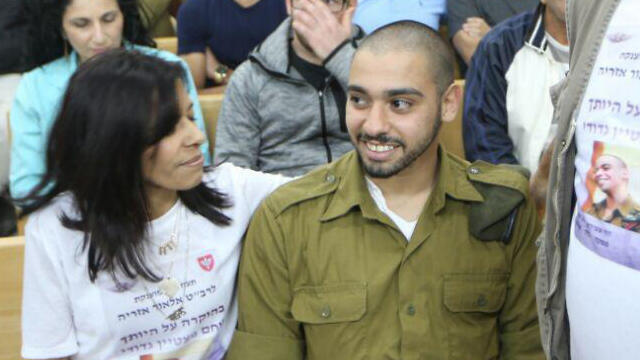 Azaria with his mother