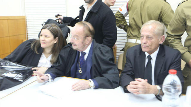 Sheftel, center, at Wednesday's hearing