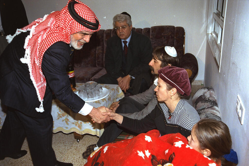 King Hussein of Jordan pays a condolence visit to the family of one of the victims of the terror attack at the Island of Peace