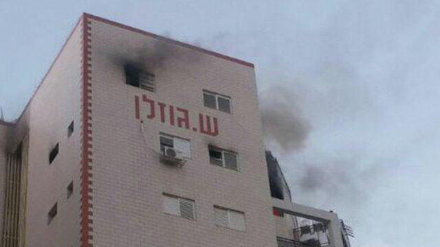 The burning building