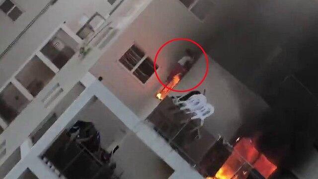 The girl jumping from a balcony to escape the blaze