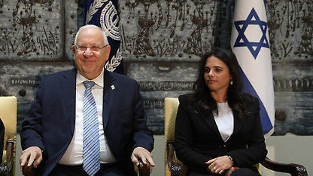President Rivlin (L) and Justice Minister Shaked agreed on an agreement relating to pardons for Israel's 70th Independence Day (צילום: אוהד צויגנברג) President Rivlin (L) and Justice Minister Shaked agreed on an agreement relating to pardons for Israel's 70th Independence Day