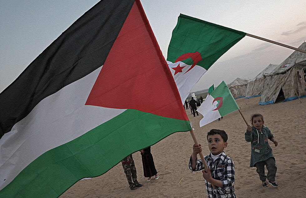 Palestinians by the border