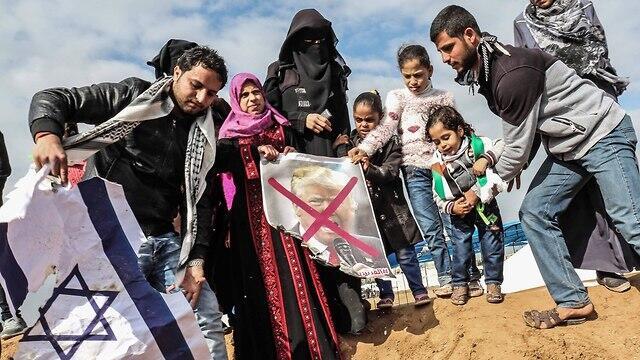 Palestinians burning Israeli flag, pictures of US President Trump