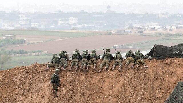 IDF soldiers on lookout, near the border