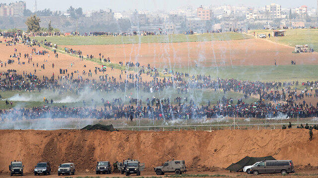Tear gas dropped onto Palestinian rioters in Gaza