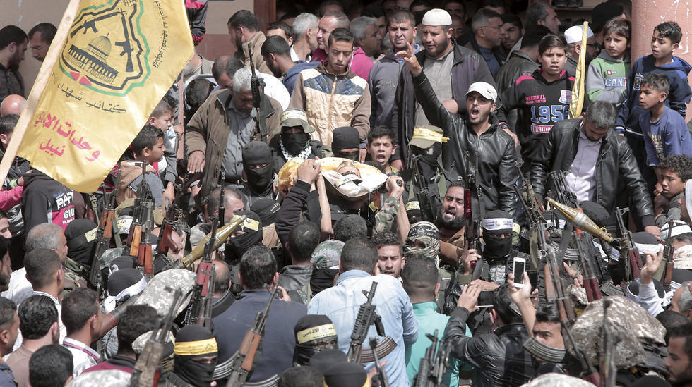 Fatah gunmen crowd funeral of Palestinian killed on Friday