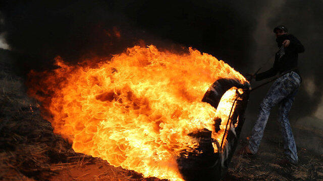 Some 10,000 tires are expected to be burned in Friday's protests near the border