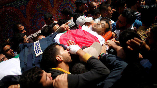 Murtaja's funeral in Gaza. The journalist was the 9th casualty in Friday's protests