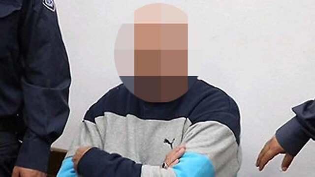 Подозреваемый в зале суда во время разбирательства по другому делу. Фото: Моти Кимхи (צילום: מוטי קמחי) Подозреваемый в зале суда во время разбирательства по другому делу. Фото: Моти Кимхи