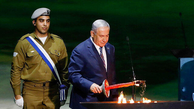 Prime Minister Netanyahu lighting a torch