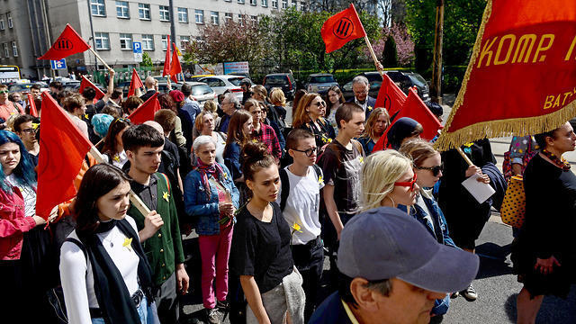 Poland stands at attention for those slain