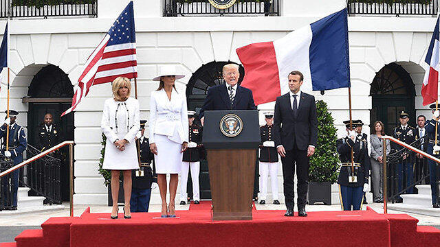 Дональд Трамп, Эммануэль Макрон и их супруги у Белого дома. Фото: AFP