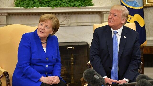 German Chancellor Merkel (L) and US President Trump