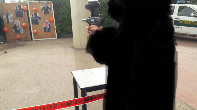 The paint gun station was meant to 'arouse interest' in participants, police said