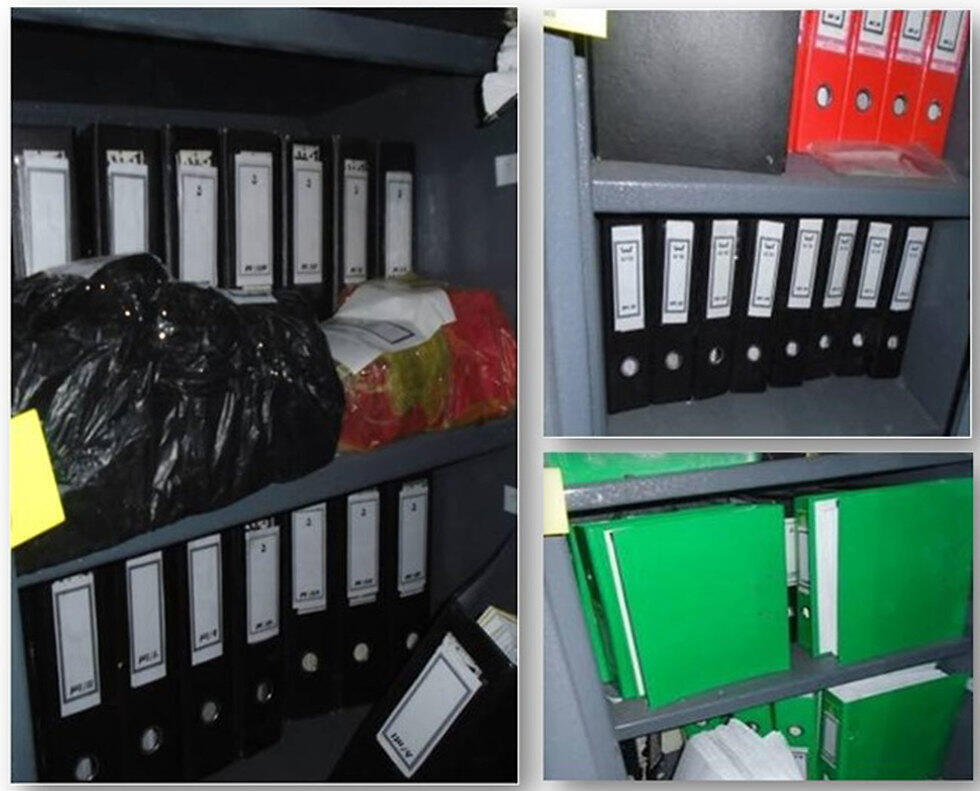 Some of the binders with the documents